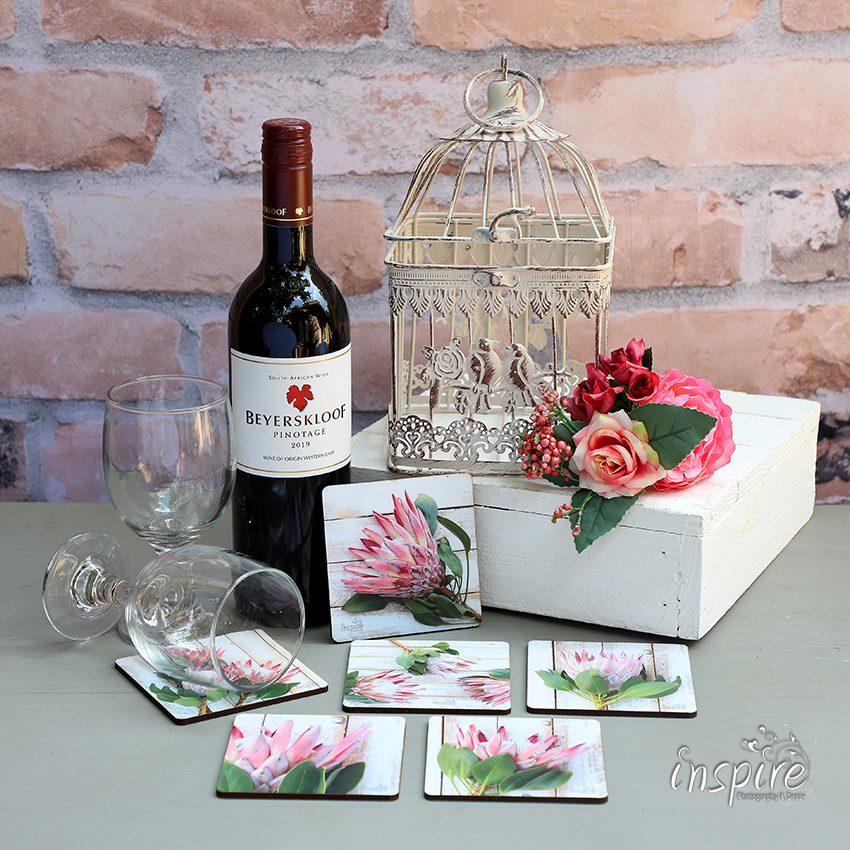 Coasters, table protection, wood, table decor, kombuis, kitchen decor, print, inspire photography and decor, pink proteas on rustic wooden background,